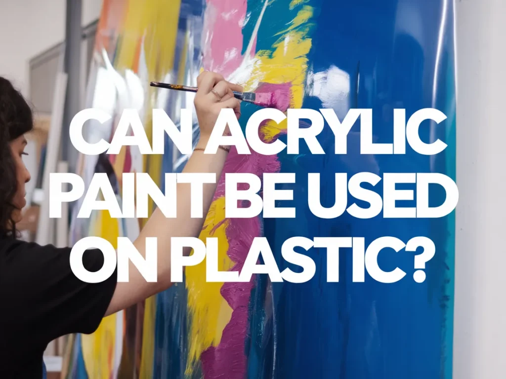 A person painting on a plastic surface with acrylic paint, illustrating the question: Can acrylic paint be used on plastic?