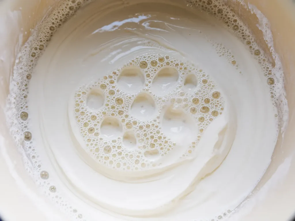 Mixing ingredients for homemade white face paint in a bowl